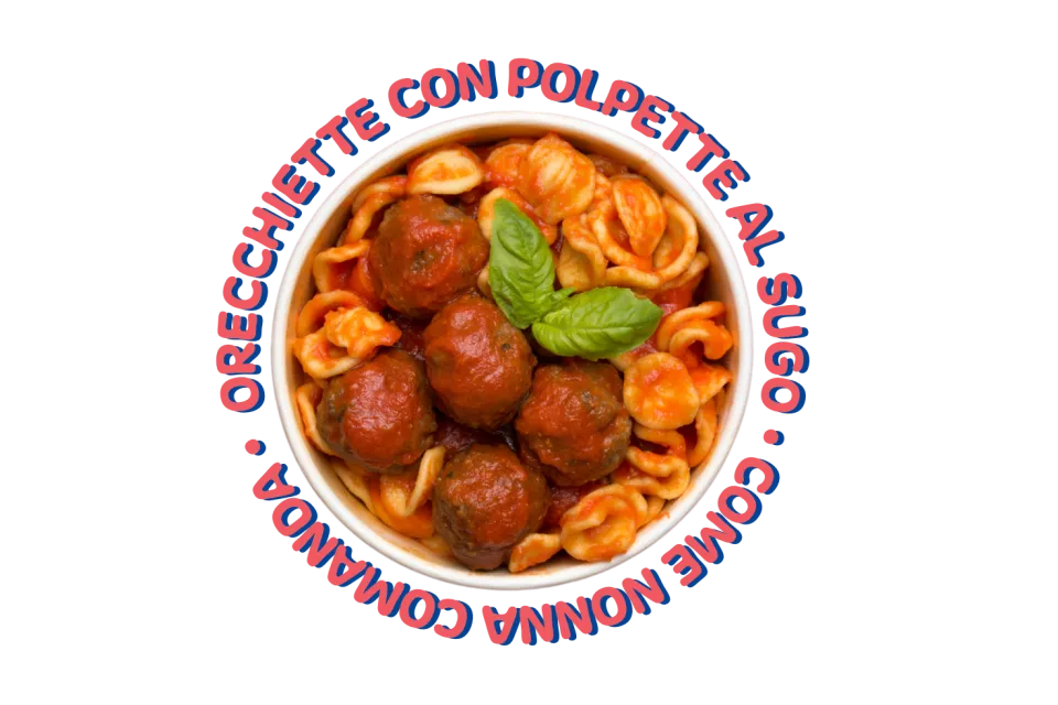Orecchiette con polpette al sugo e basilico in una ciotola